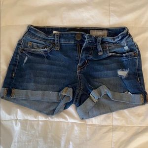 dark washed ripped denim shorts